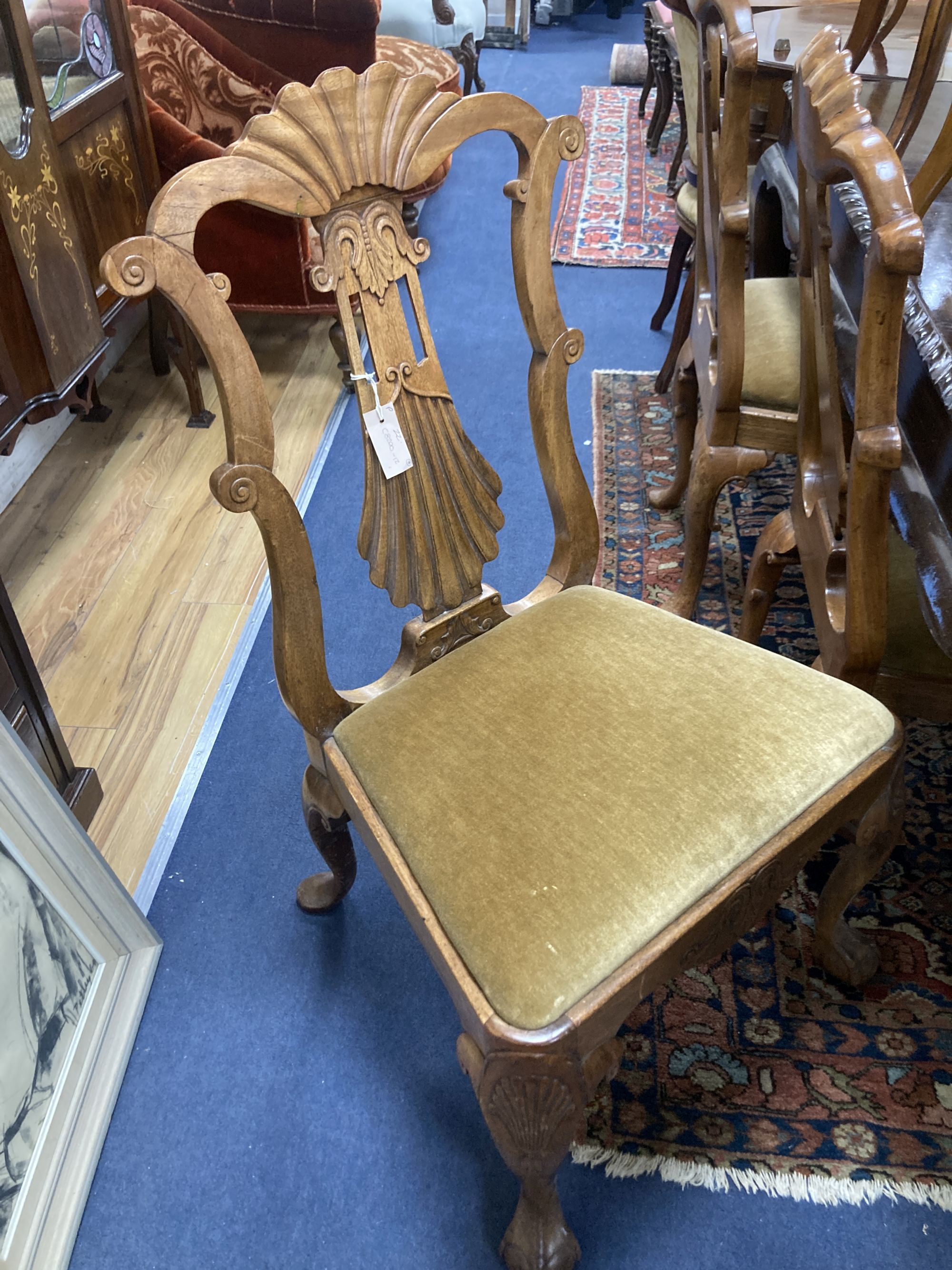 A set of eight Chippendale style mahogany dining chairs, including two carvers,